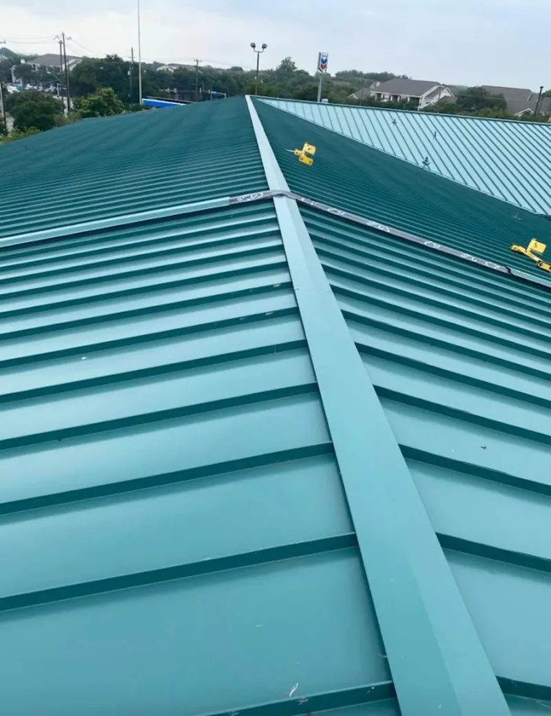 Green commercial metal roof ridge and valley for Metal Roof Repair in Tewksbury