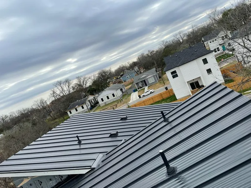Standing seam metal roof panels with vents for Skylight Repair in Tewksbury
